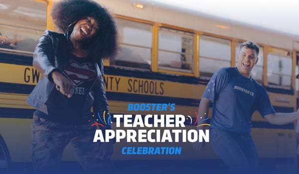 image of Booster employees dancing in front of a school bus celebrating Teacher Appreciation