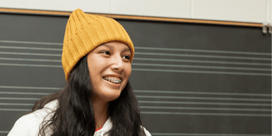 band student with yellow hat - High School Donation Fundraisers