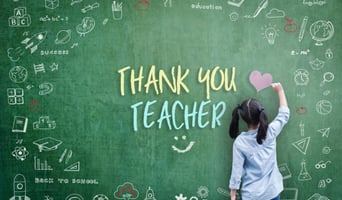 Image of girl writing on a chalkboard Thank You Teacher for Teacher Appreciation Day