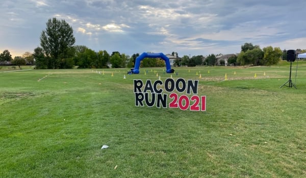 Image of a fun run set up outside on a field