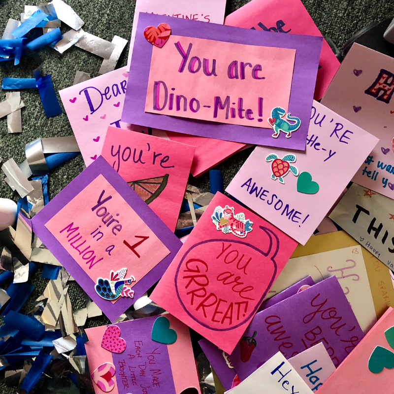 A pile of handwritten valentines cards made by Boosterthon team Indianapolis. 