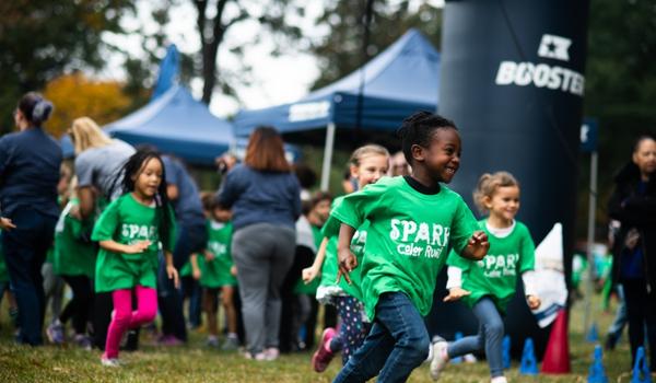 Kids running outside for a fun run