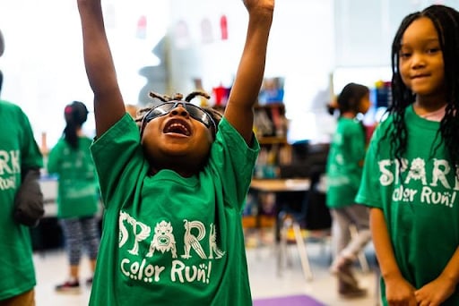 Cheering child in spirit gear